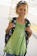 Portrait of kindergarten girl with backpack
