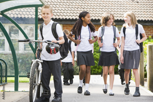 Photo: Junior school children leaving school Junior school children leaving school