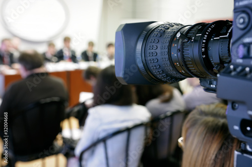Photo: TV camera at press conference. TV camera at press conference.