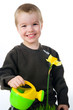 Cute little boy watering the flower Cute little boy watering the flower