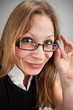 Smiling business woman in glasses