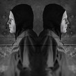 twin hooded figures