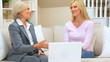 Young Client Meeting with Financial Advisor at Home Young Client Meeting with Financial Advisor at Home