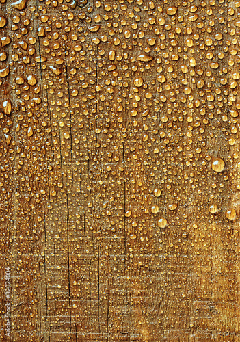 Photo: water drops on wood water drops on wood