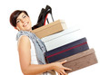 Foto: Pretty woman carrying a lot of shoes Pretty woman carrying a lot of shoes