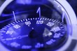 blue nautical compass closeup focus on east blue nautical compass closeup focus on east