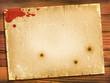 Old paper texture with red blood on wood background.Retro Old paper texture with red blood on wood background.Retro
