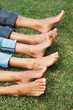 Family lying together on grass