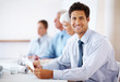 Confident business man attending a meeting Confident business man attending a meeting