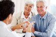 Advantages of investment - Excited old couple listening advisor