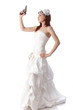Young woman in a wedding dress with gun.