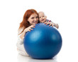 Happy family with  fitness ball.