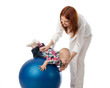 Happy family with  fitness ball.