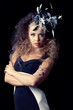 Beautiful young woman wearing a fashion hat
