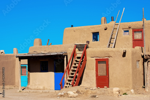 Photo: Bright colorful doors of ancient Taos Pueblo, NM Bright colorful doors of ancient Taos Pueblo, NM