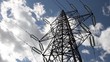 electricity pylon over a cloudy sky