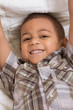 Photo: Young little boy in checkered shirt and jeans Young little boy in checkered shirt and jeans