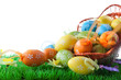 color easter eggs in basket isolated on white