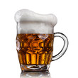 Beer in glass with water drops isolated on white