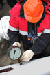 Gas production operator works
