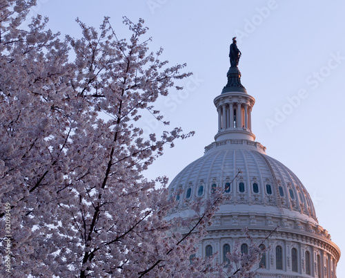Photo: Sunrise behind the dome of the Capitol in DC Sunrise behind the dome of the Capitol in DC