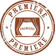 Stamp with the text Premiere written inside the stamp