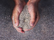 Hands holding sand