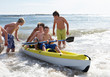 Teenage boys kayaking Teenage boys kayaking