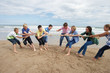 Photo: Teenagers playing tug of war Teenagers playing tug of war