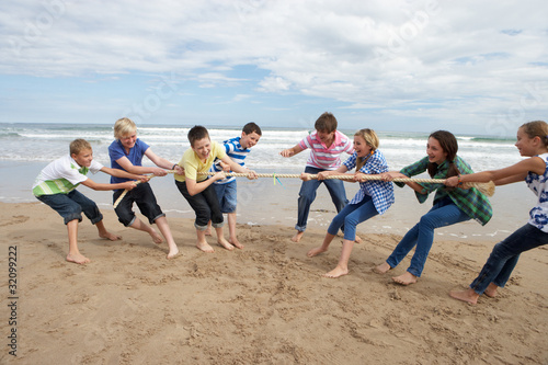 Photo: Teenagers playing tug of war Teenagers playing tug of war