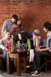 Photo: Young friends in café Young friends in café