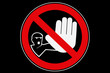 "don't touch!" sign on black