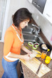 Woman preparing her breakfast