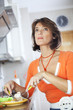 Woman eating her breakfast