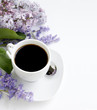 Cup of coffee and spring flowers