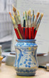 Pot with paintbrushes