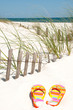 Flip flops on sand dune