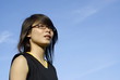 ����: Asian teen girl looking to the future with blue sky � palangsi #32139680
