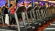 people doing sports in a gym 2 people doing sports in a gym 2