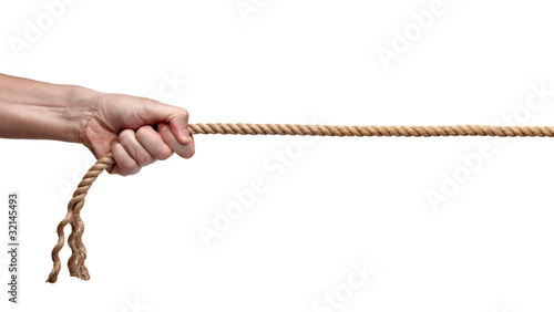 Photo: man pulling rope man pulling rope