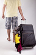 man walking with a suitcase and loosing the luggage.
