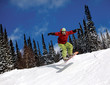 Snowboarder jumping