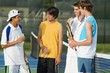 Group Of Tennis Players On A Court