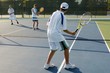 Group Of Tennis Players On A Court