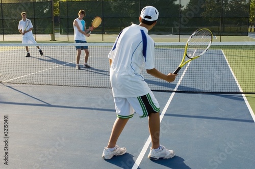 Photo: Group Of Tennis Players On A Court Group Of Tennis Players On A Court