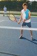 Foto: Doubles Tennis Players On A Court Doubles Tennis Players On A Court