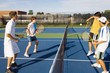 Group Of Tennis Players On A Court