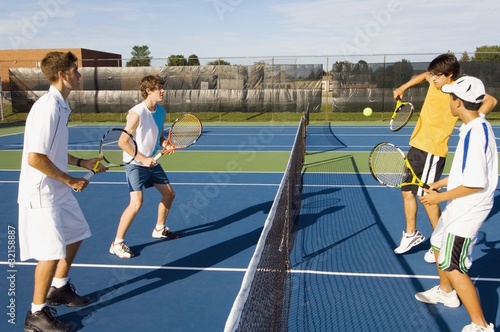 Photo: Group Of Tennis Players On A Court Group Of Tennis Players On A Court