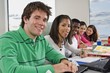 Students In A Classroom With A Laptop