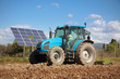 tractor farming in field